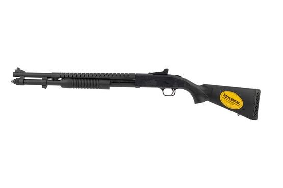 Mossberg 590 Persuader pump action shotgun features ghost ring sights